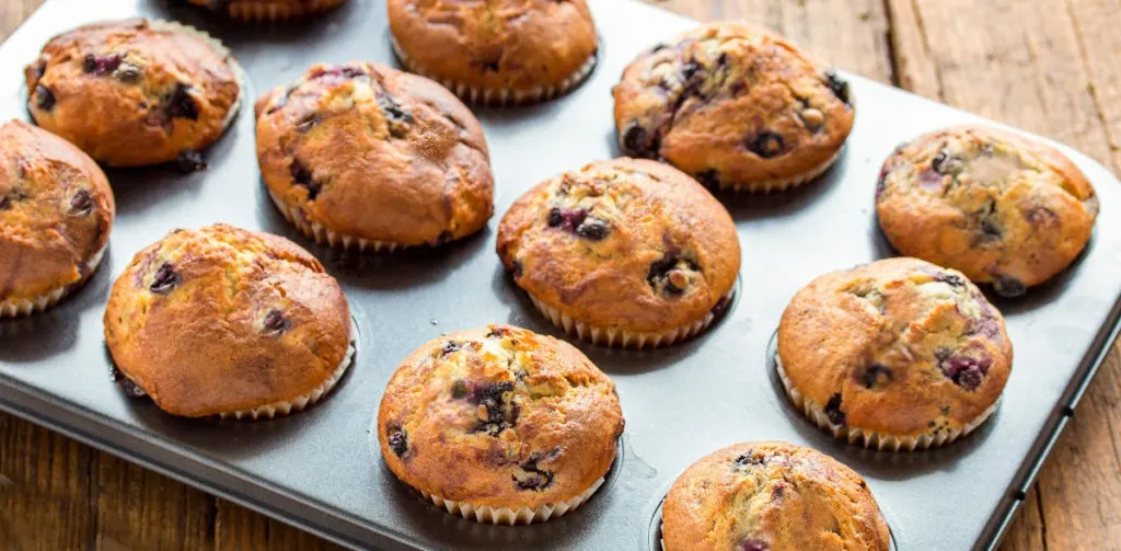 keto-friendly blueberry muffins baked in a muffin tin