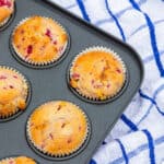 low carb raspberry muffins in a muffin tin cooling