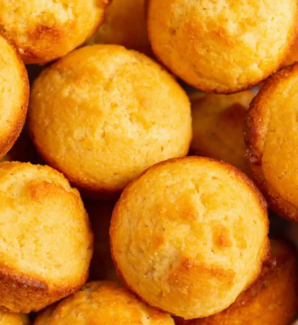 Coconut flour cornbread muffins close up in a basket