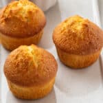 keto coconut flour cornbread muffins on white plate