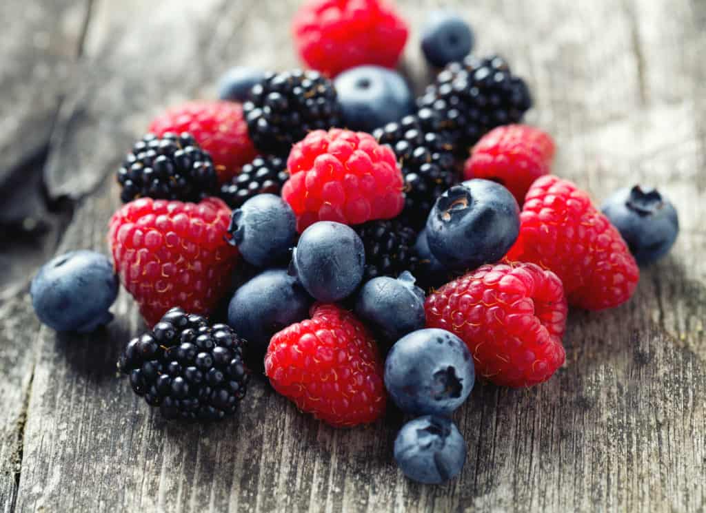 Keto friendly berries on a wood board