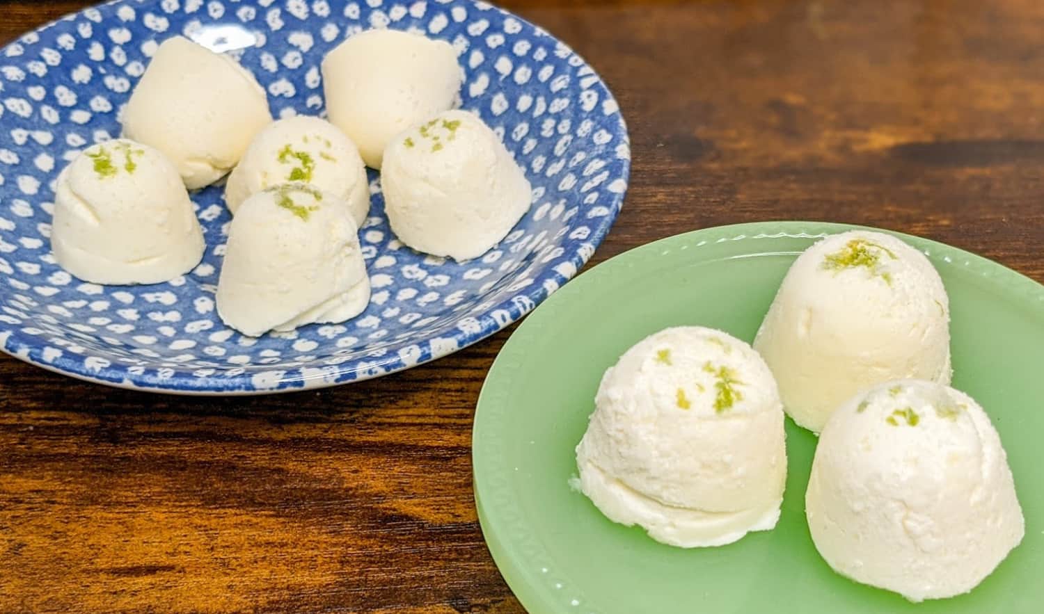 keto key lime cheesecake fat bombs on a blue poke dot plate and a small green stand