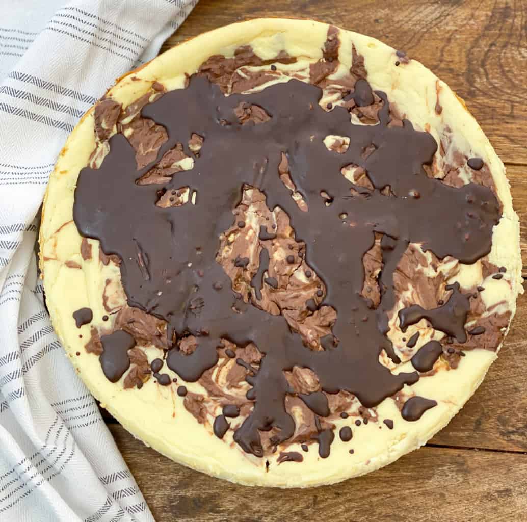 a picture of a keto marble cheesecake whole unsliced