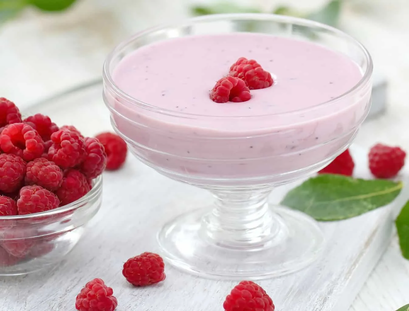 keto raspberry mousse in a small clear dish
