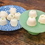 key lime cheesecake fat bombs on stand and plate