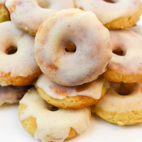 KETO BROWN BUTTER DONUTS ON WHITE PLATE STACKED UP CLOSE FIT TO SERVE