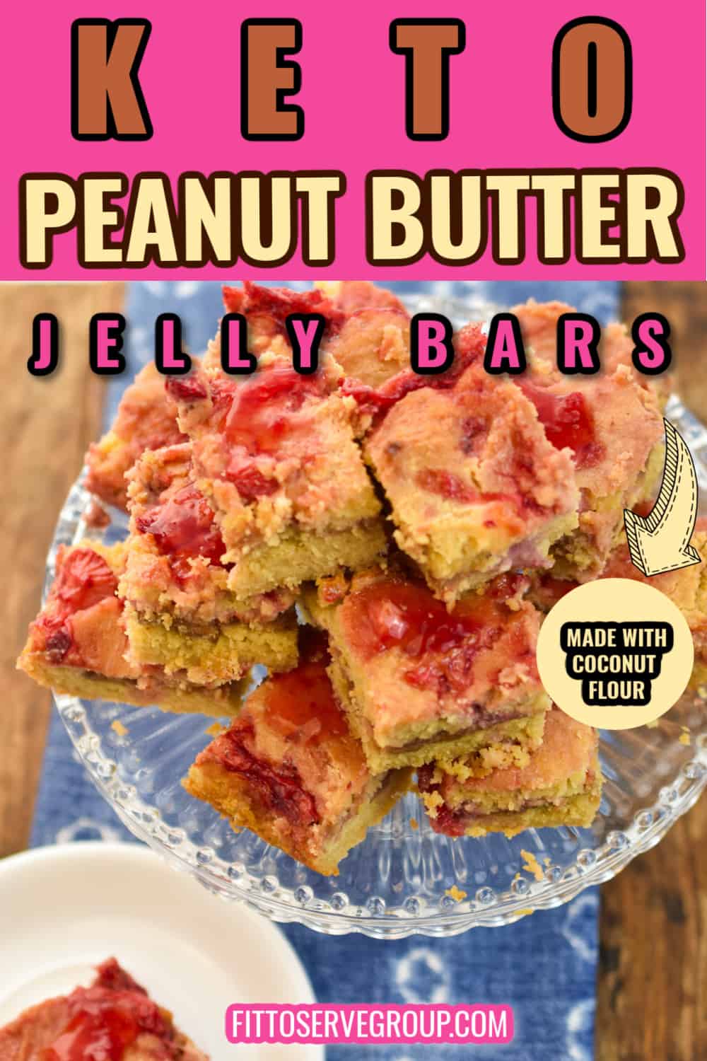 Keto Peanut Butter Jelly Bars on a clear cake stand
