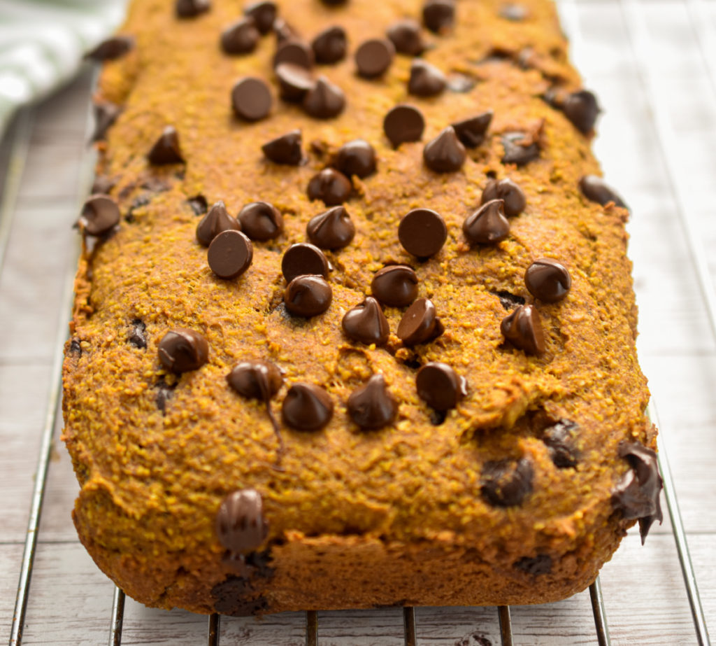 keto pumpkin chocolate chip bread cooling on a baking rack