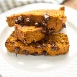 keto pumpkin chocolate chip bread three slices on a white plate