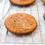 keto snickerdoodle cookies close up on a baking rack