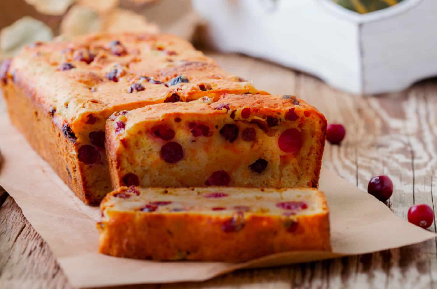 keto pumpkin cranberry bread being sliced