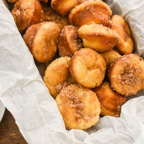 keto churro minis in parchment paper with coffee fit to serve