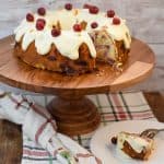 Keto Cranberry Cake on a wood cake stand