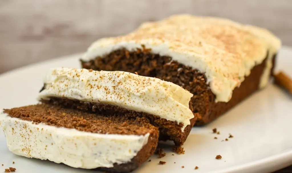 keto gingerbread loaf on a white platter