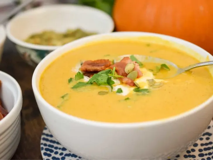 keto pumpkin soup served in a white bowl