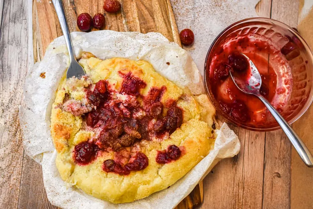 Keto Baked Brie topped with Cranberry Sauce