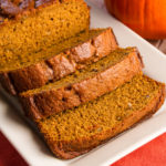 Keto pumpkin high fiber bread sliced on a white plate