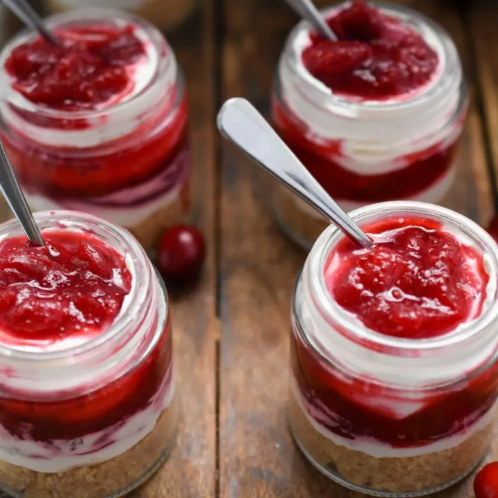 keto no bake cranberry cheesecake minis with spoons ready to eat