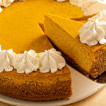 keto pumpkin cheesecake with a dollop of whipped cream
