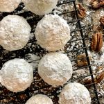 Keto Mexican wedding cookies on a cooling rack