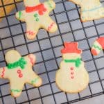 Keto Rolled Sugar Cookies decorated with icing on cooling rack