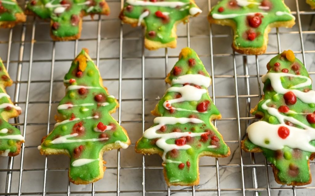 keto Christmas tree sugar cookies decorated and baking rack