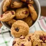 Keto faux oatmeal dried cranberry cookies in a white bowl