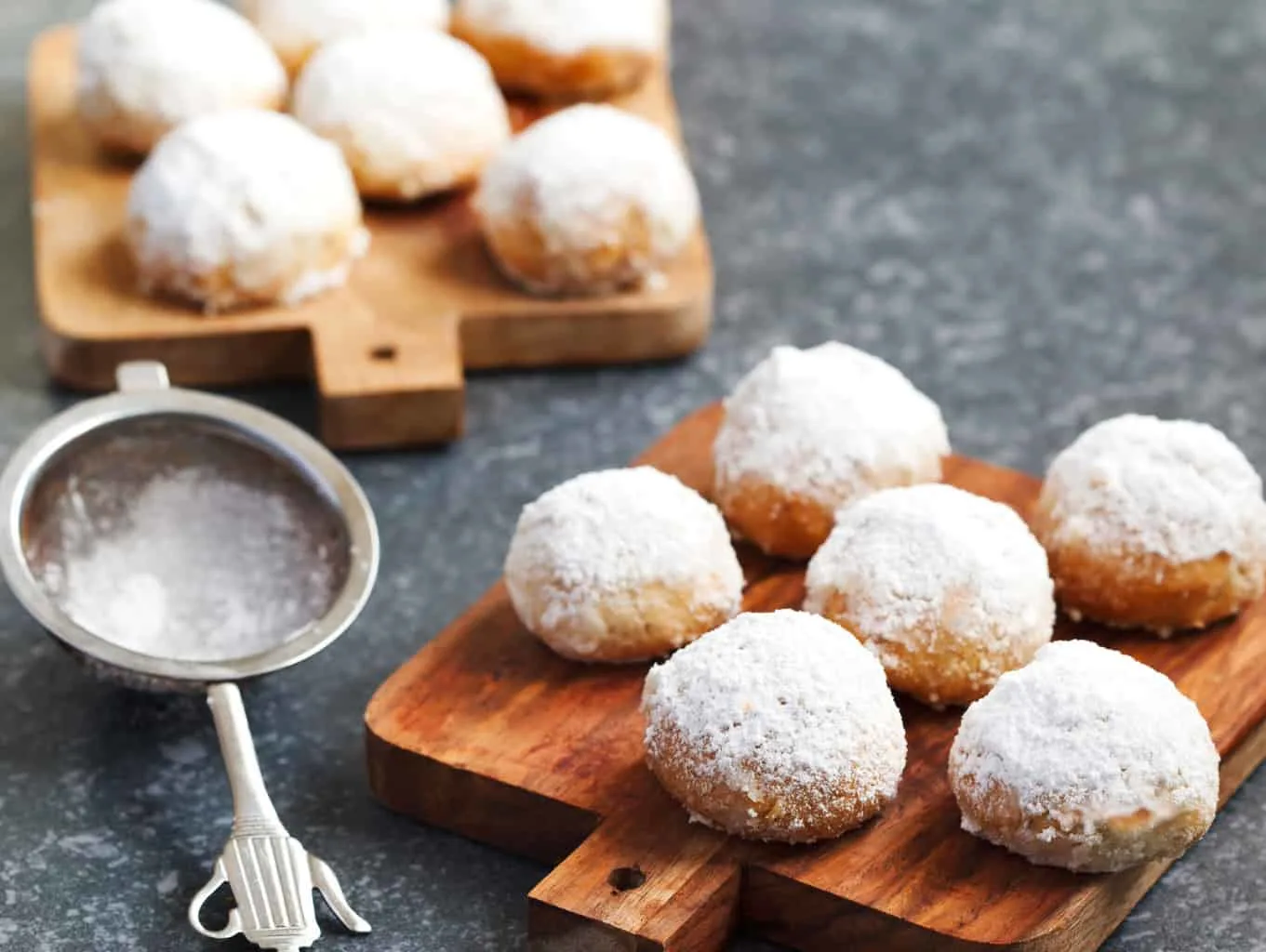 Keto snowball cookies dusted with sugar-free confectioners sugar