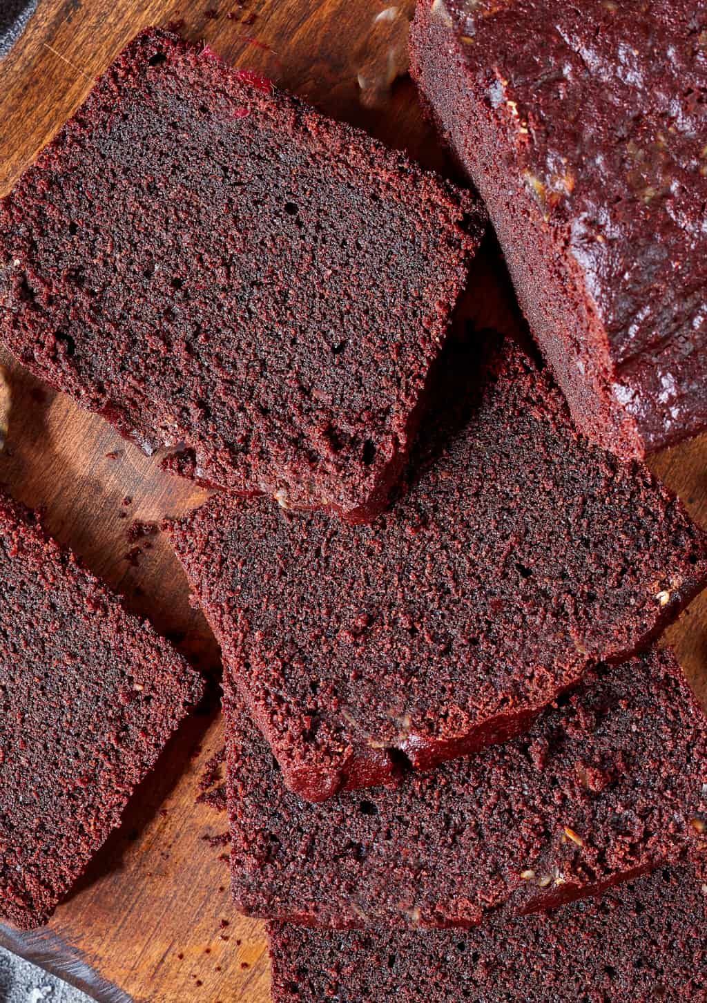 keto chocolate bread sliced on a wood board