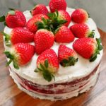 keto red velvet cake with whole strawberry topping