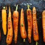 Roasted carrots on a baking sheet