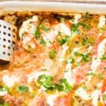keto enchiladas baked in a white rectangle pan