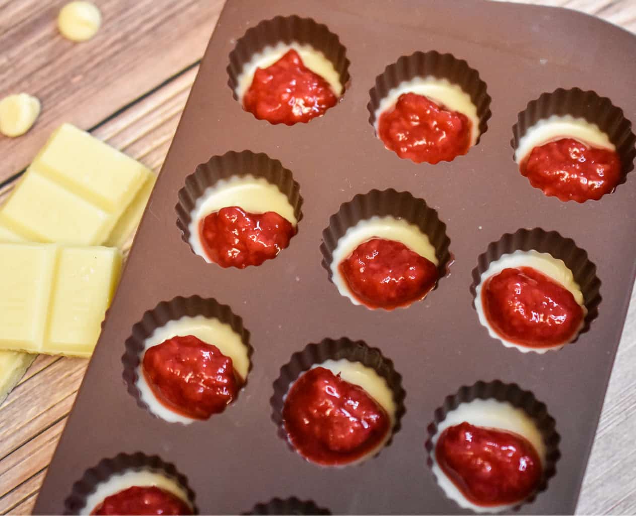 keto white chocolate raspberry fat bombs being made (