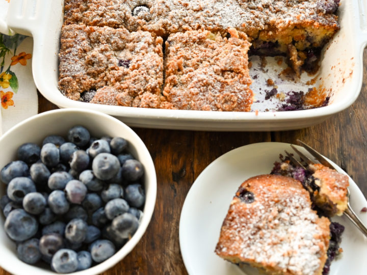 keto blueberry buckle cake sliced and served