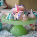 keto french meringues on green pedestal close up