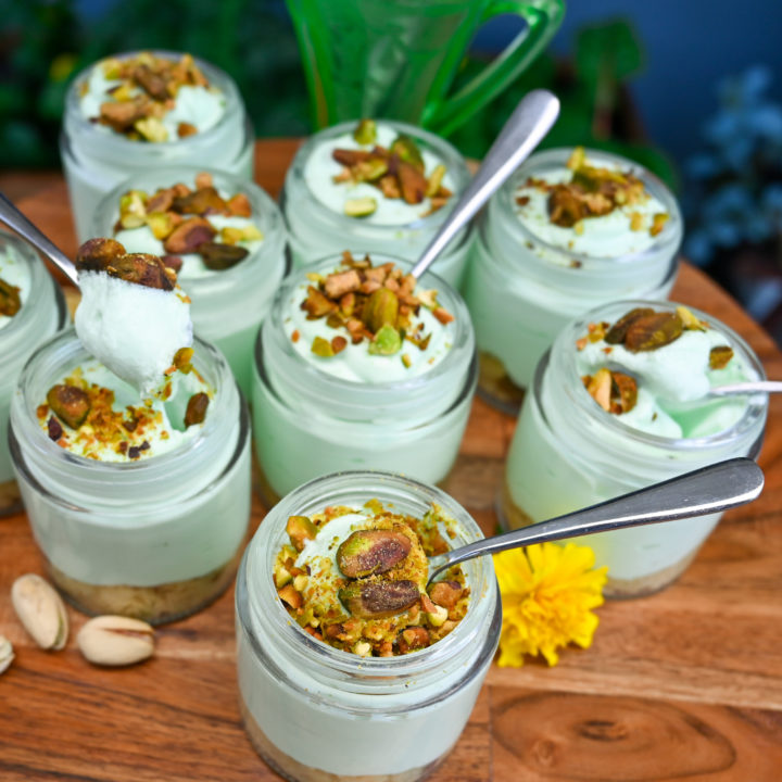 keto pistachio no bake cheesecake made in 4 ounce mason jars