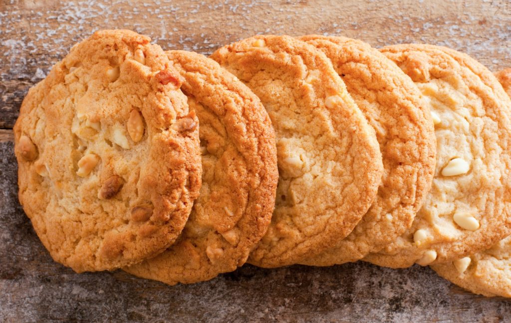 keto white chocolate macadamia cookies in a white plate