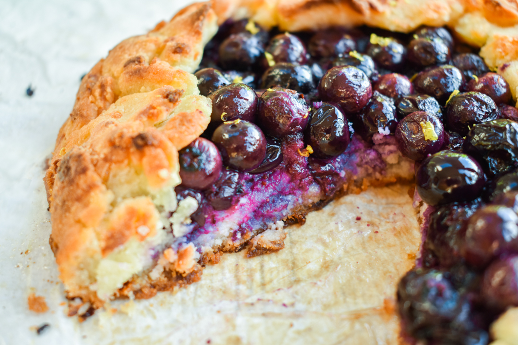 Keto blueberry galette with slice removed and upclose