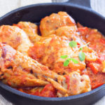 Keto Cuban chicken fricassee made in a cast-iron skillet