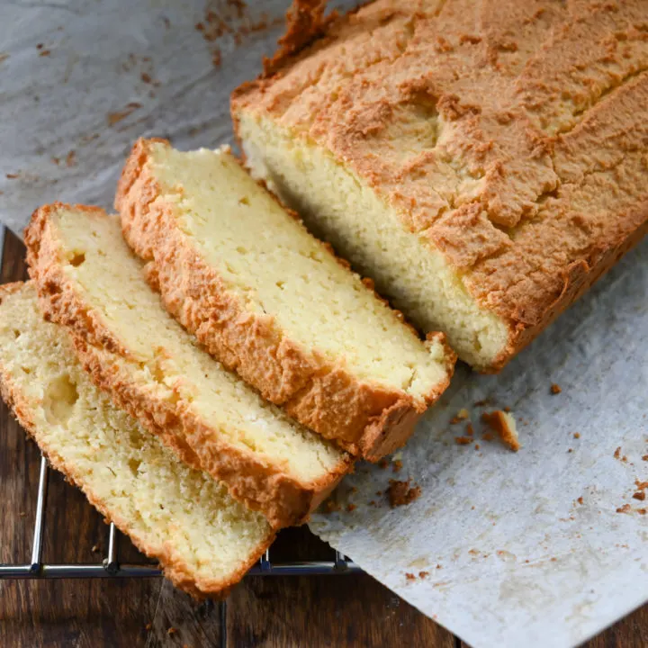 keto sour cream bread sliced on a cooling rack