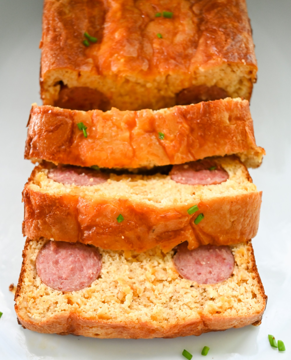 keto kielbasa cornbread sliced on a white platter