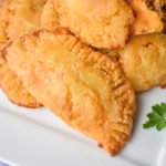 keto ground beef empanadas on white plate up close
