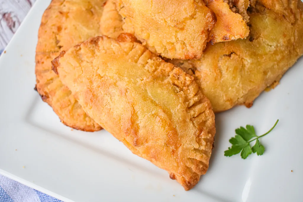 keto ground beef empanadas on white plate up close