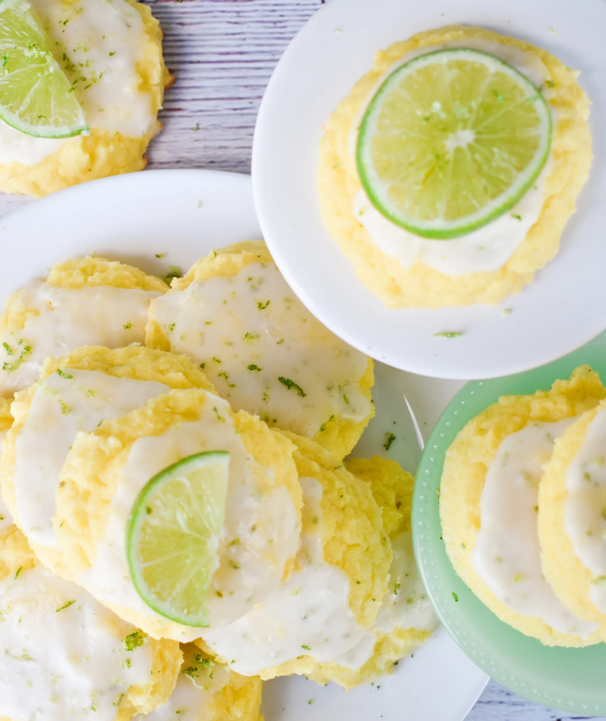keto lime cookies served on different white and green plates and ready to enjoy