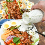 keto Cobb salad with blue cheese dressing being poured on top