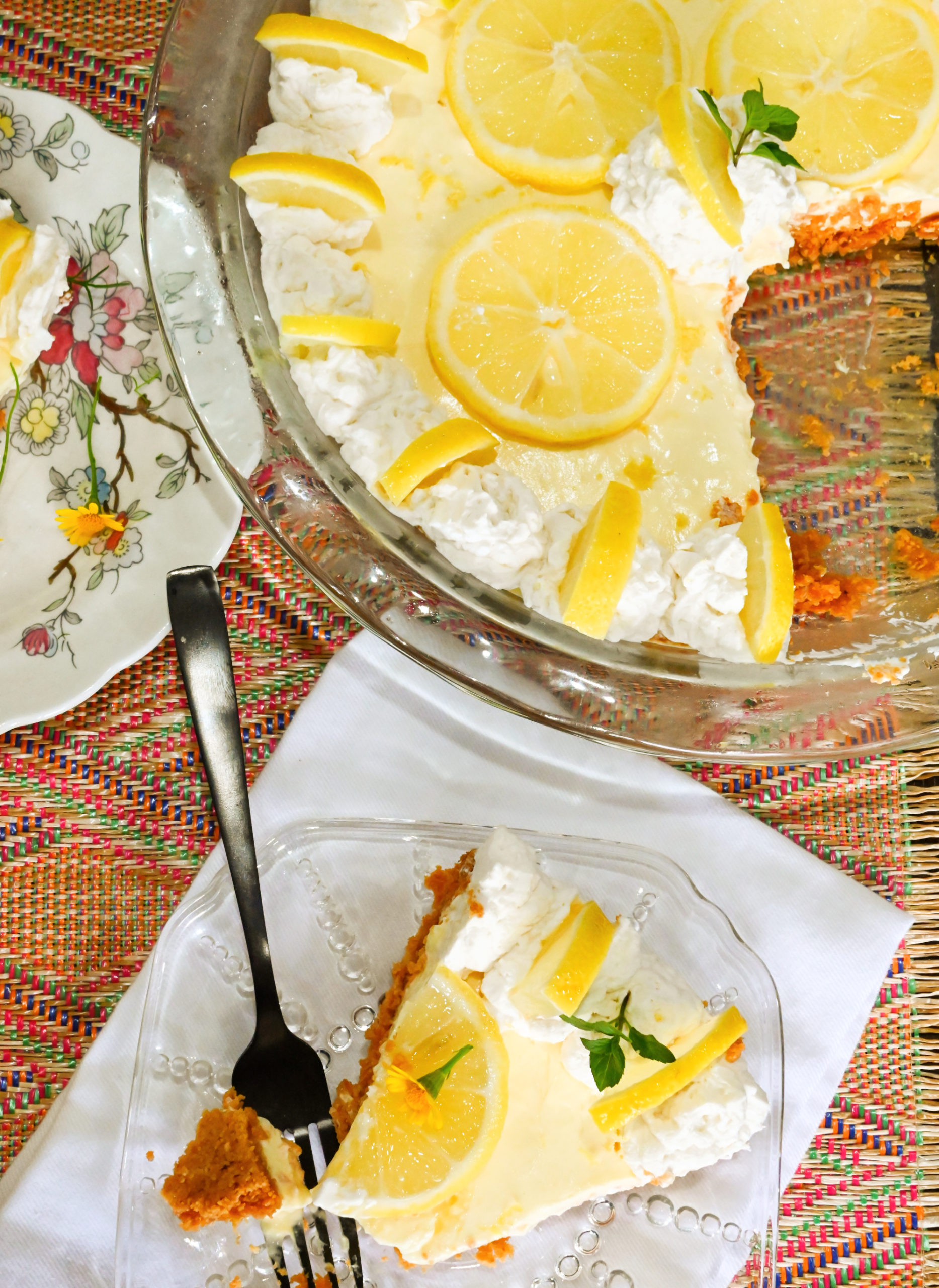 keto sour cream lemon pie baked in a clear pie dish