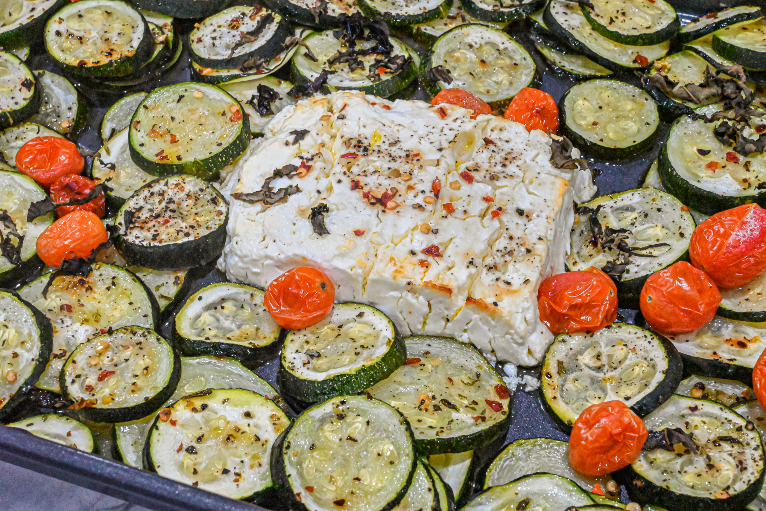 keto baked feta zucchini on bakng sheet