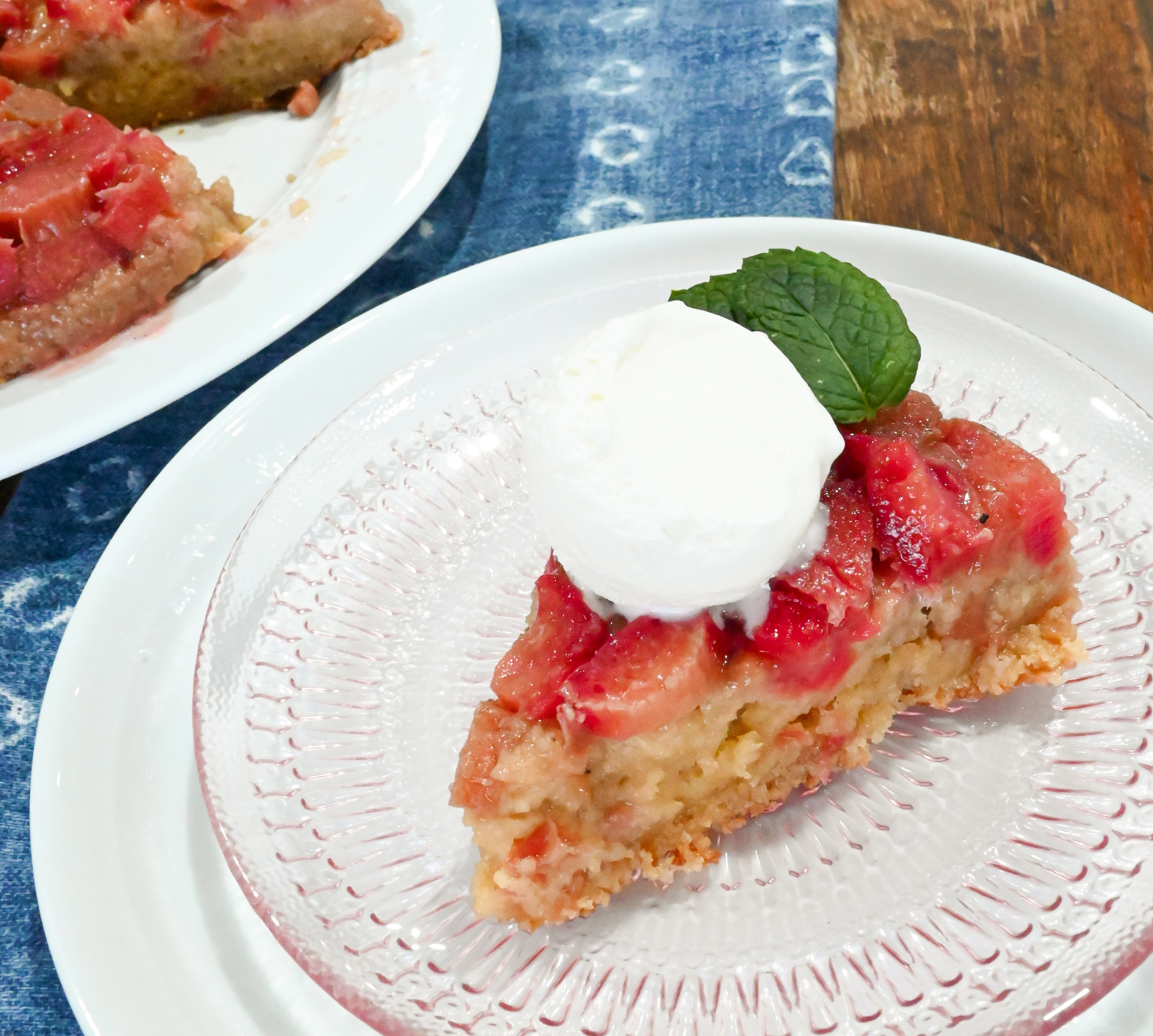 keto rhubarb upside down cake slice served with a scoop of vanilla keto friendly ice cream