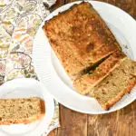 keto zucchini bread made with coconut flour sliced on a white plate