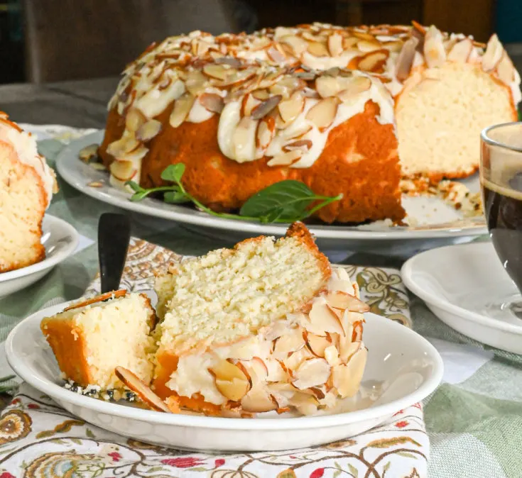 Gluten-free almond cake sliced and served